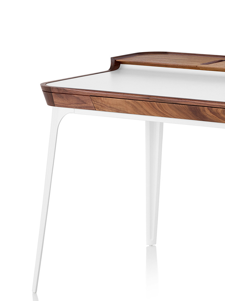 Inset laminate writing surface is easy to clean.