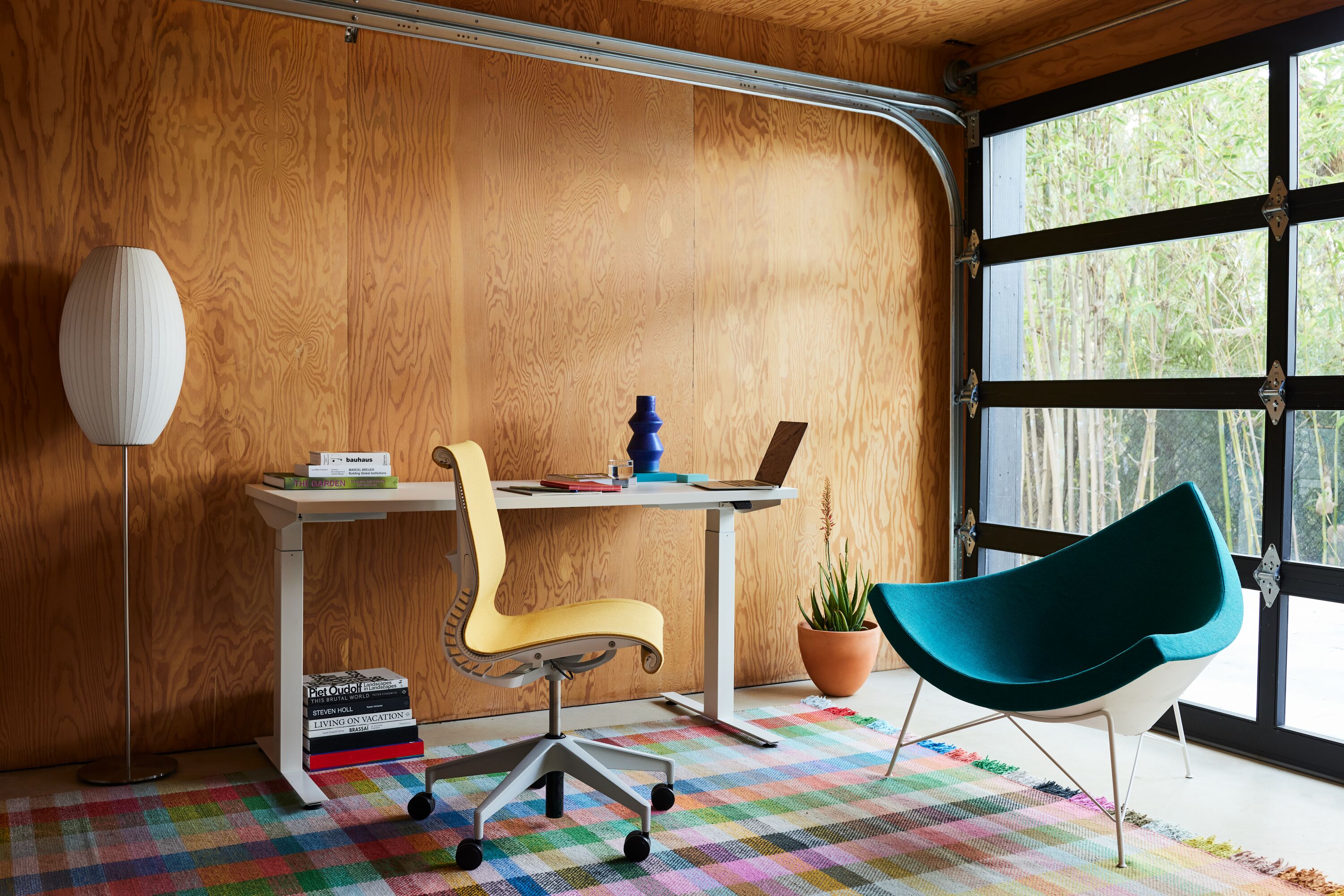 The Eames management chair is part of the Eames Aluminum Group Collection.