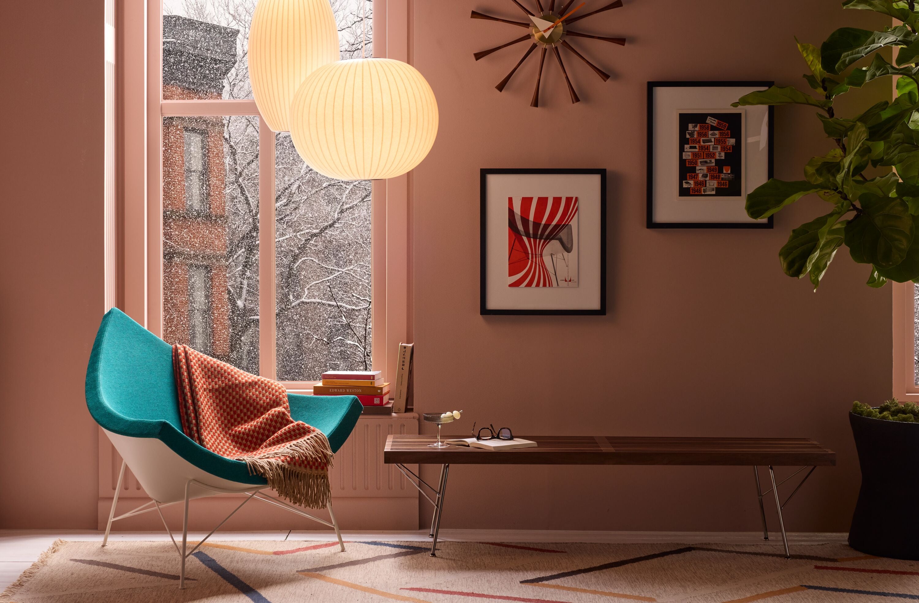 Close up view of a Graphite Aeron swivelled at a 45 degree angle in a home working setting