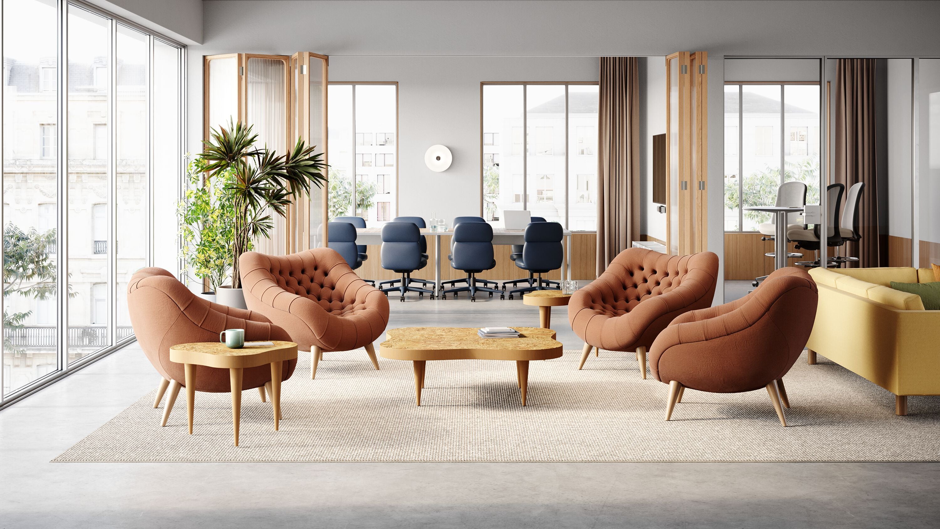 An AbakEnvironments Desk with a walnut top and polished legs, with a graphite Aeron Chair in a light home office setting and Folk Ladder Shelving.