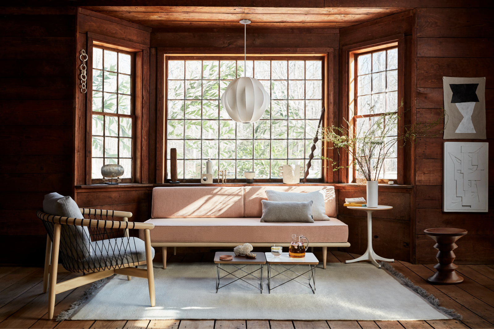 Close up view of a Graphite Aeron swivelled at a 45 degree angle in a home working setting