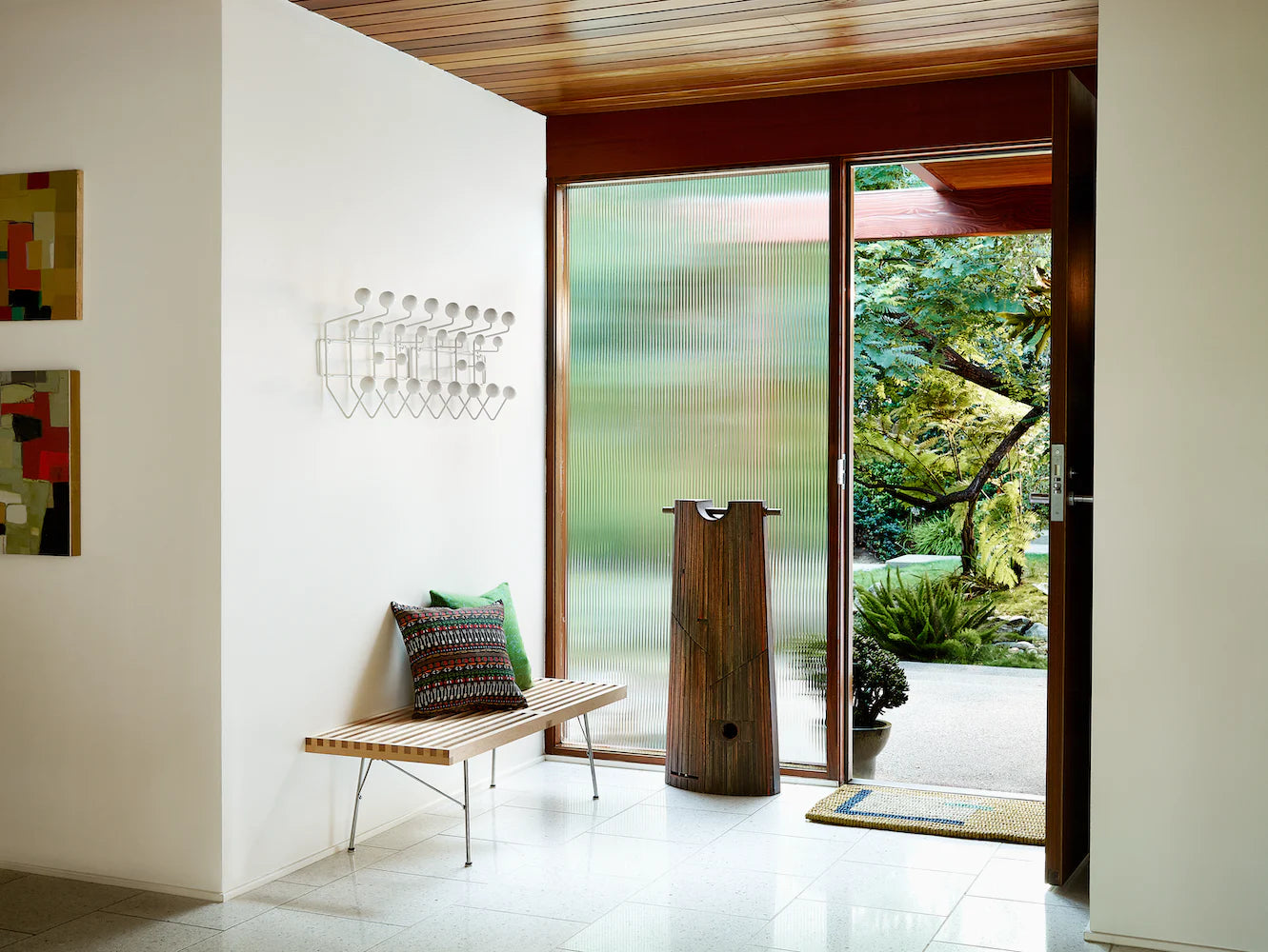 Close up view of a Graphite Aeron swivelled at a 45 degree angle in a home working setting