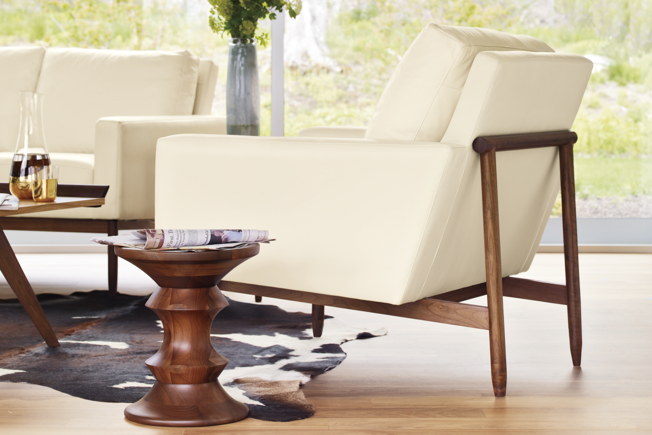 Close up view of a Graphite Aeron swivelled at a 45 degree angle in a home working setting